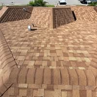 Tom Joyce Roofing Inc logo
